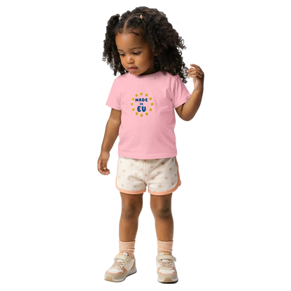 Pink "Made in EU" Embroidered Baby T-shirt on a Girl Front View